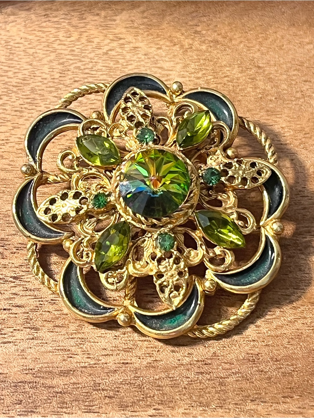 Gold-Tone Floral Brooch with Green Crystal Accents